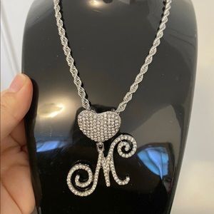 Blinged out rhinestone letter M necklace